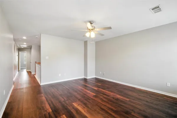 a kitchen that has a sink and a table in it