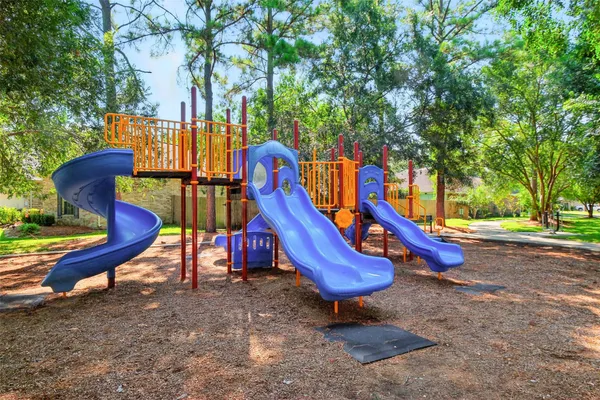 a view of a park with slide