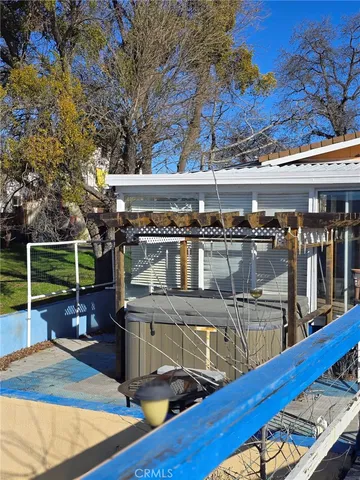 a view of a chairs and table on the wooden floor