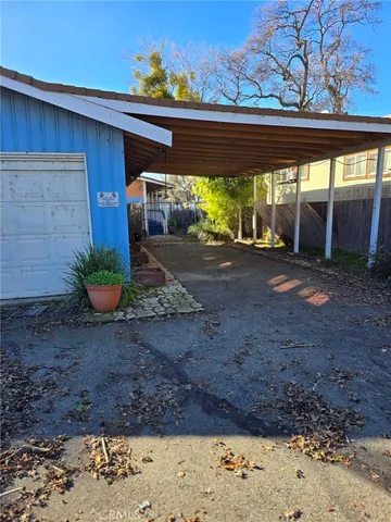 a view of a backyard with a patio