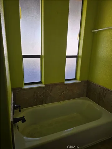 a bathroom with a bathtub