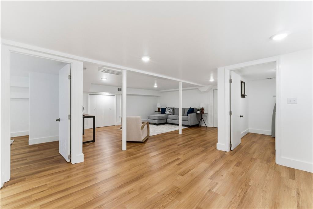 2975 Nursery Road Southeast Smyrna, GA 30082 - Photo 20 of 36 a view of a living room kitchen and a wooden floor
