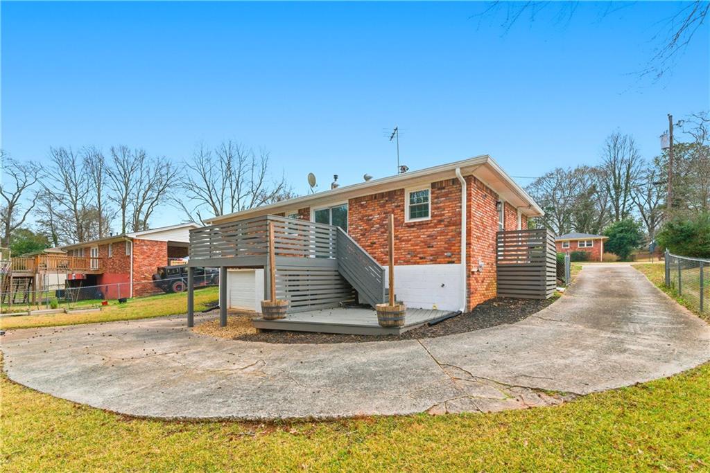 2975 Nursery Road Southeast Smyrna, GA 30082 - Photo 27 of 36 a view of a house with backyard and trees