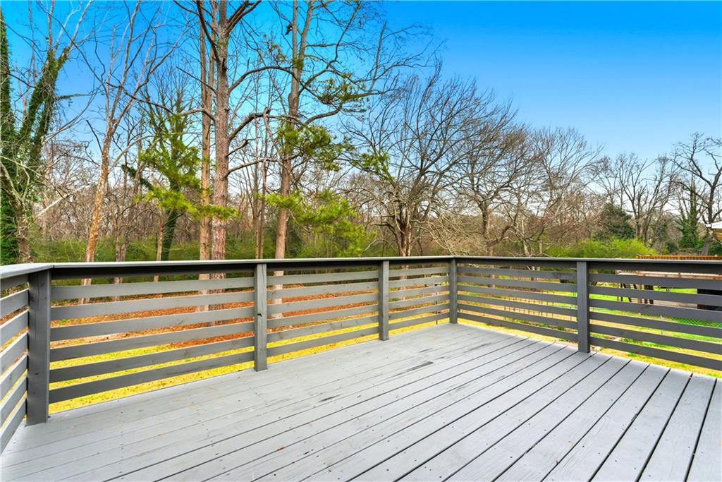 2975 Nursery Road Southeast Smyrna, GA 30082 - Photo 30 of 36 a view of outdoor space with deck and tall trees