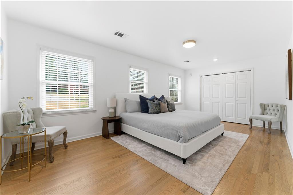 2975 Nursery Road Southeast Smyrna, GA 30082 - Photo 8 of 36 a living room with furniture and a large window