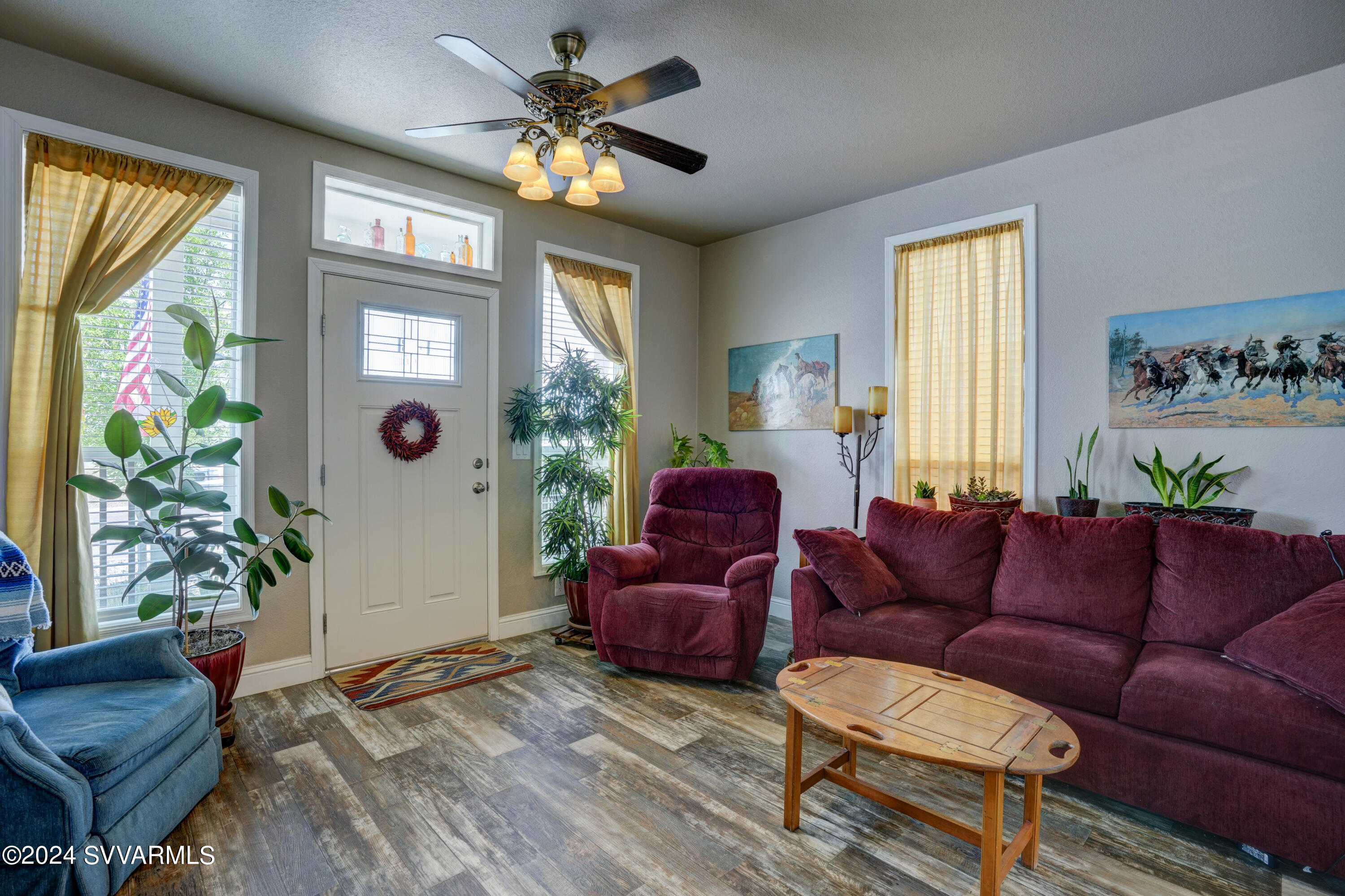 999 Thorton Road, Unit 21 Camp Verde, AZ 86322 - Photo 10 of 23 a living room with furniture and a large window