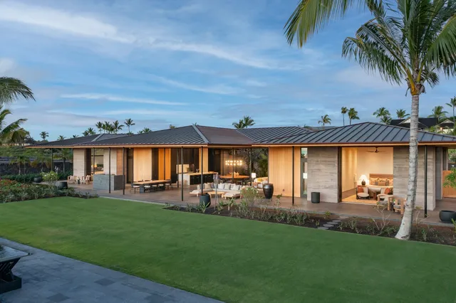 a view of a house with a yard porch and sitting area