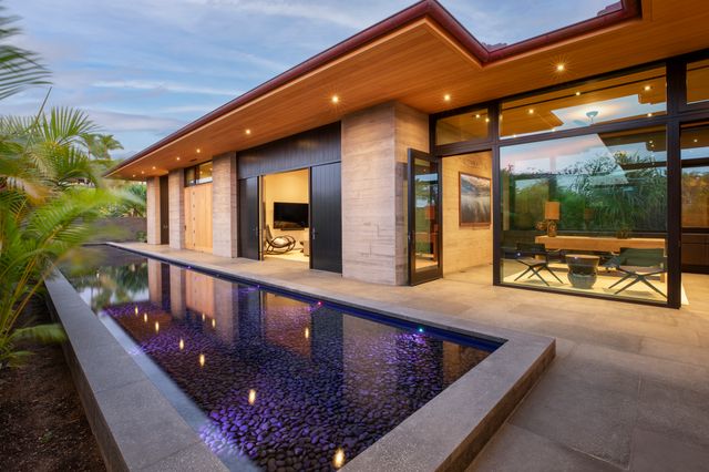 a view of swimming pool with a patio