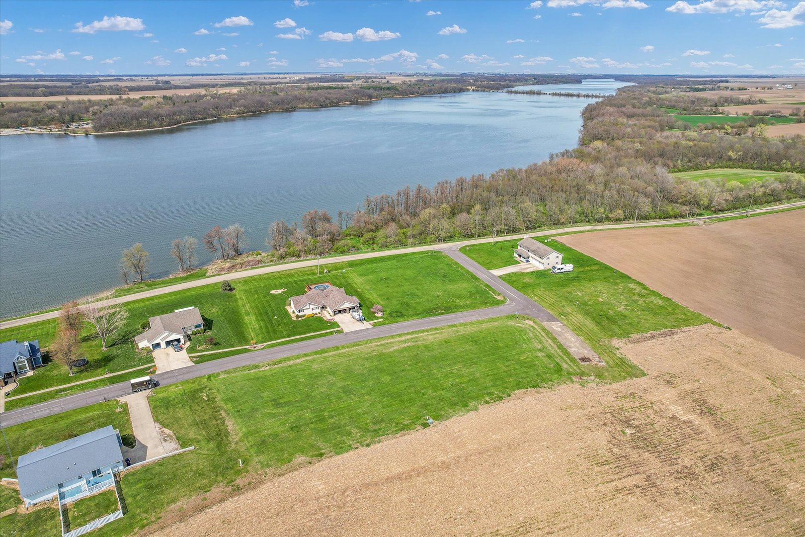18041 Lakeview Drive Weldon, IL 61882 - Photo 14 of 17 a view of a lake with a big yard