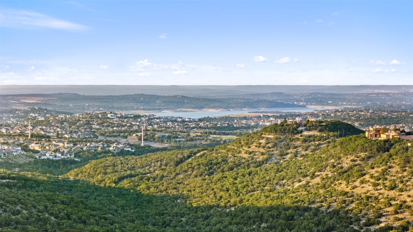 17210 Flint Rock Road Austin, TX 78738 - Photo 2 of 13 an aerial view of residential building and ocean view