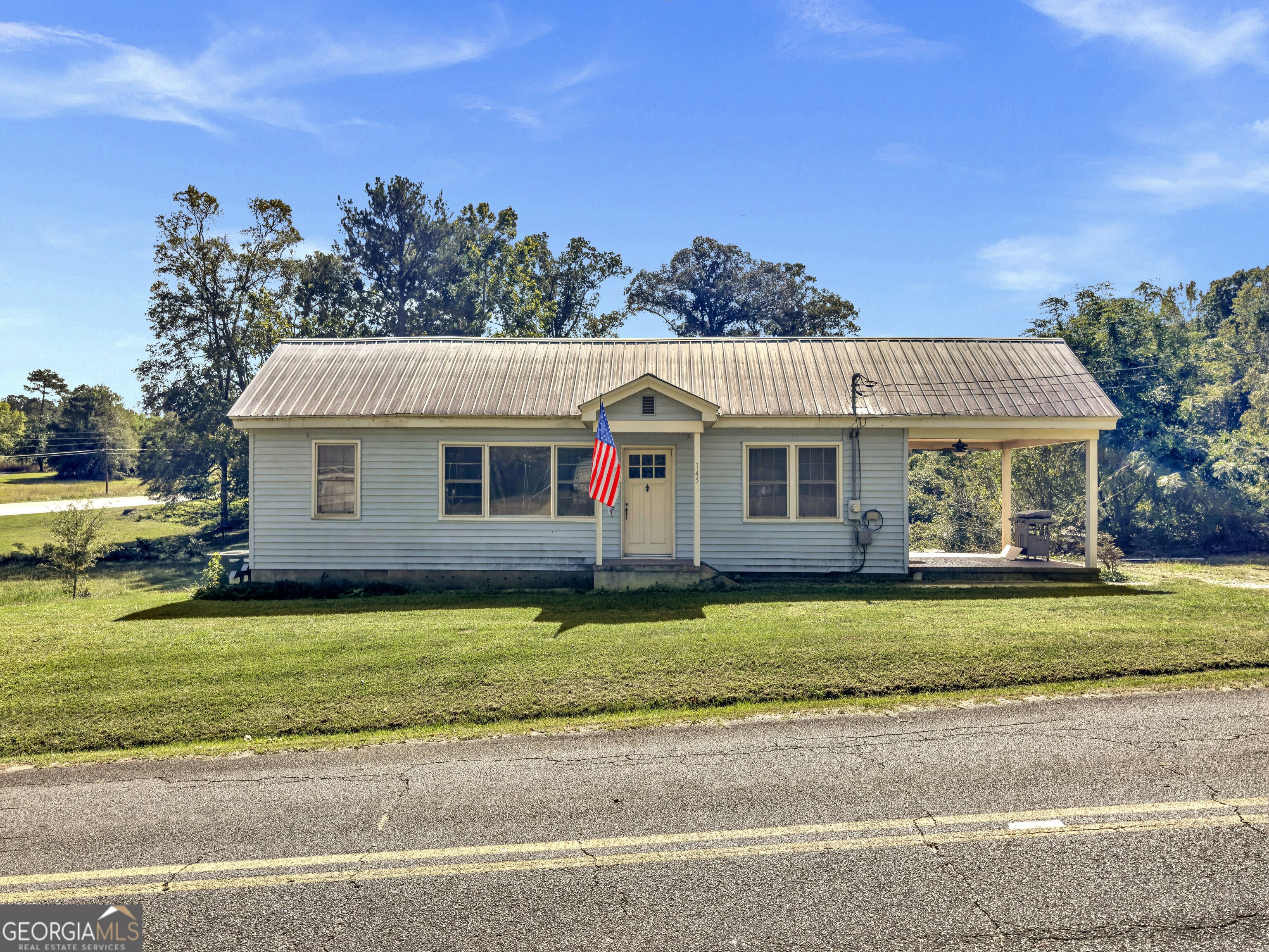 a view of a house with a swimming pool