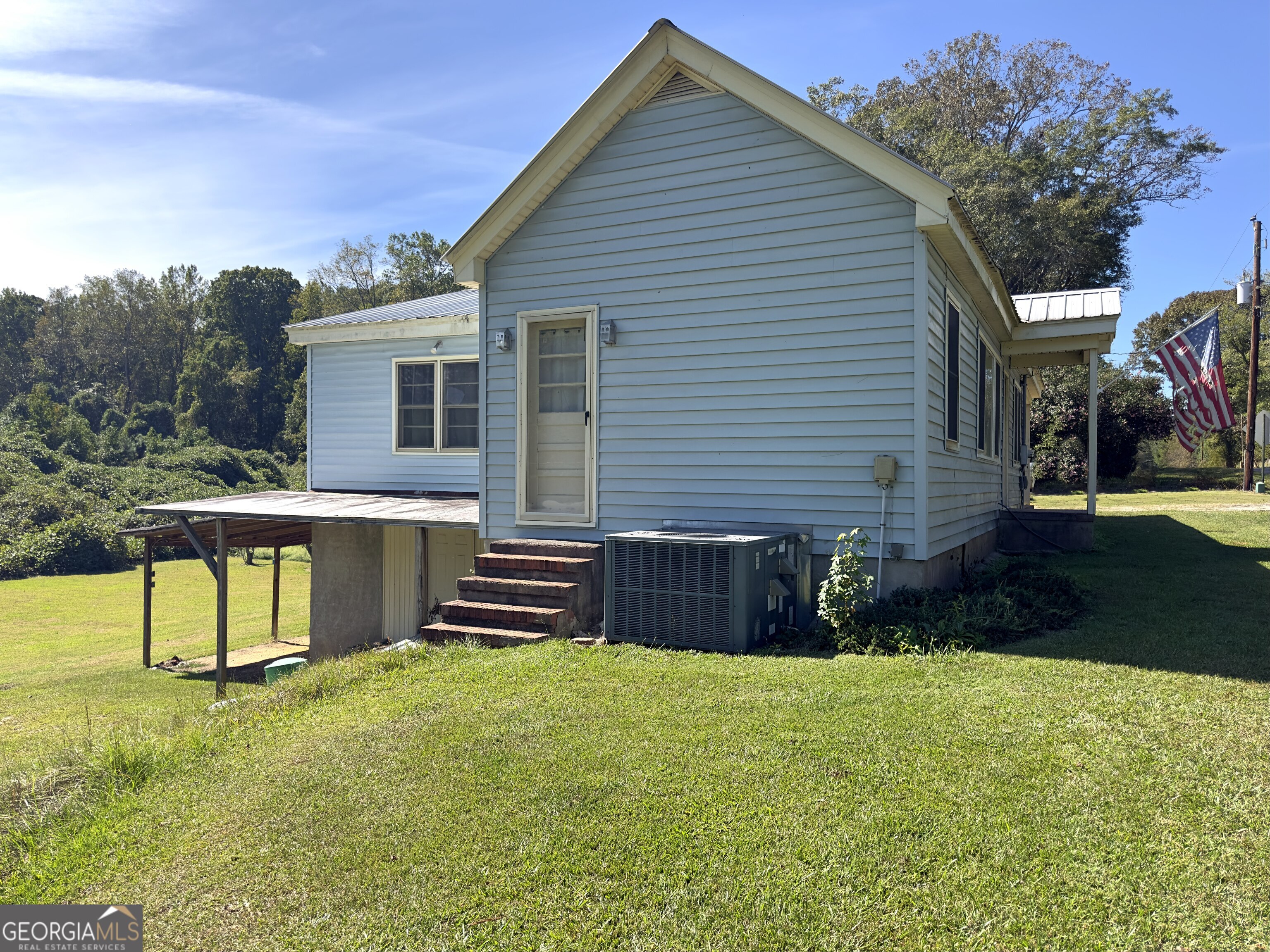 145 Apple Road Thomaston, GA 30286 - Photo 12 of 43 a view of a house with a yard