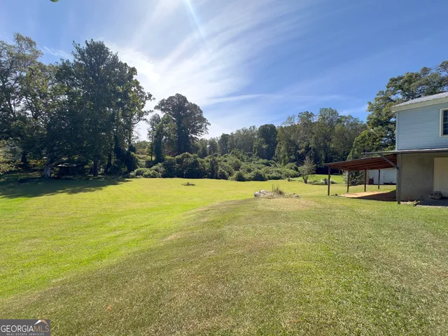 swimming pool view with a outdoor space