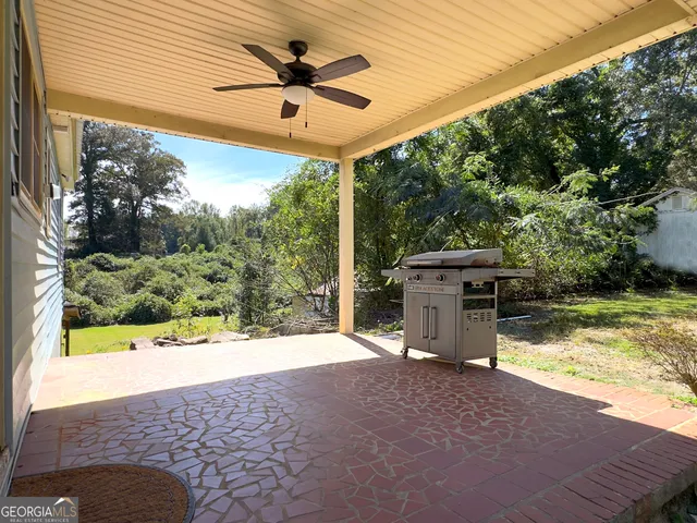 a view of a terrace with a yard