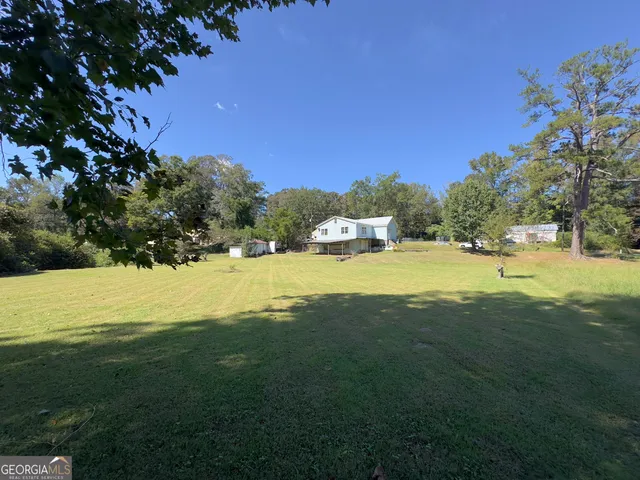 a view of an outdoor space and swimming pool