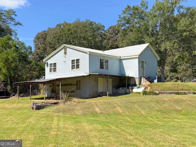 a view of a house with a swimming pool