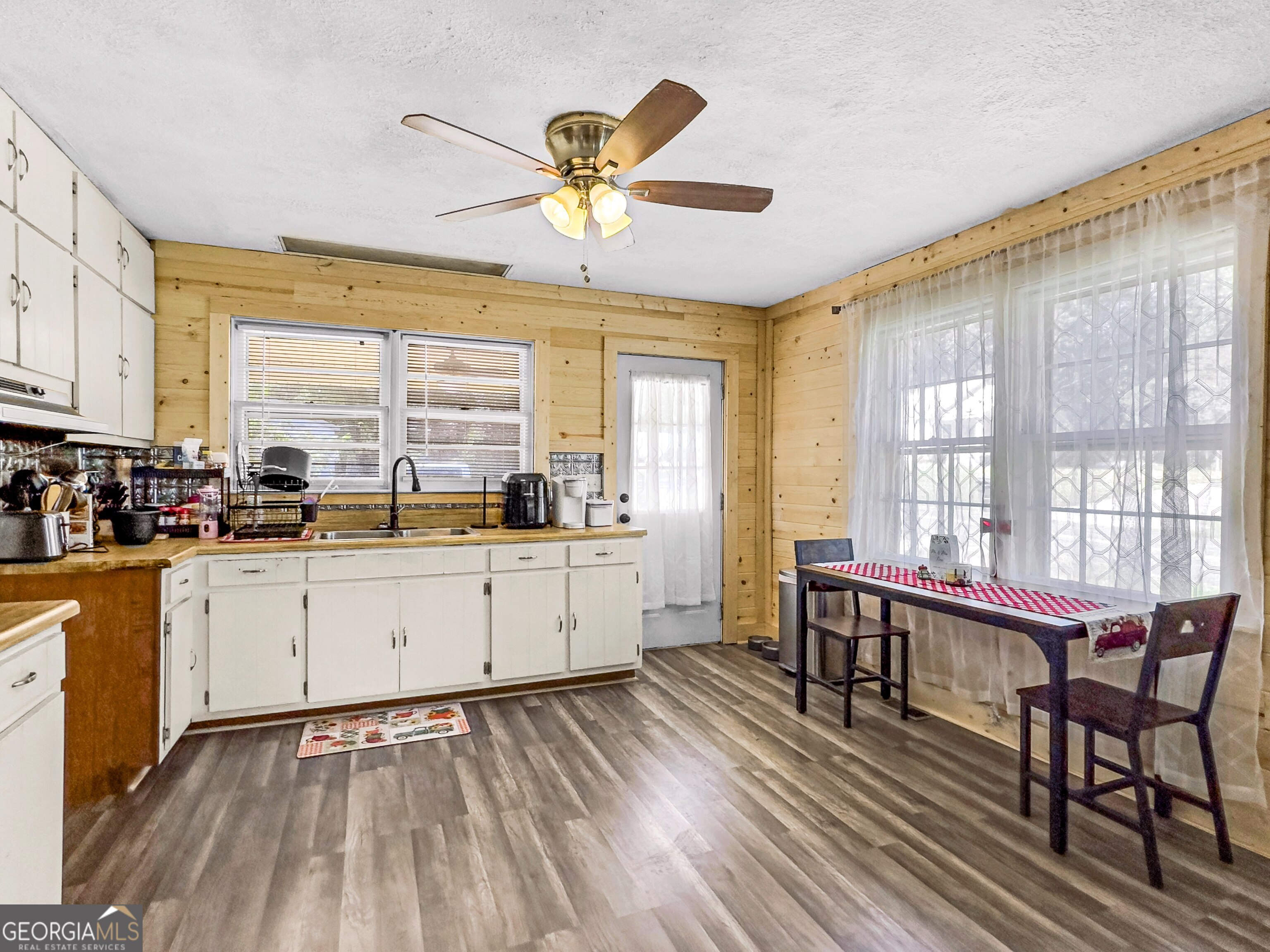 145 Apple Road Thomaston, GA 30286 - Photo 25 of 43 a large white kitchen with a large window