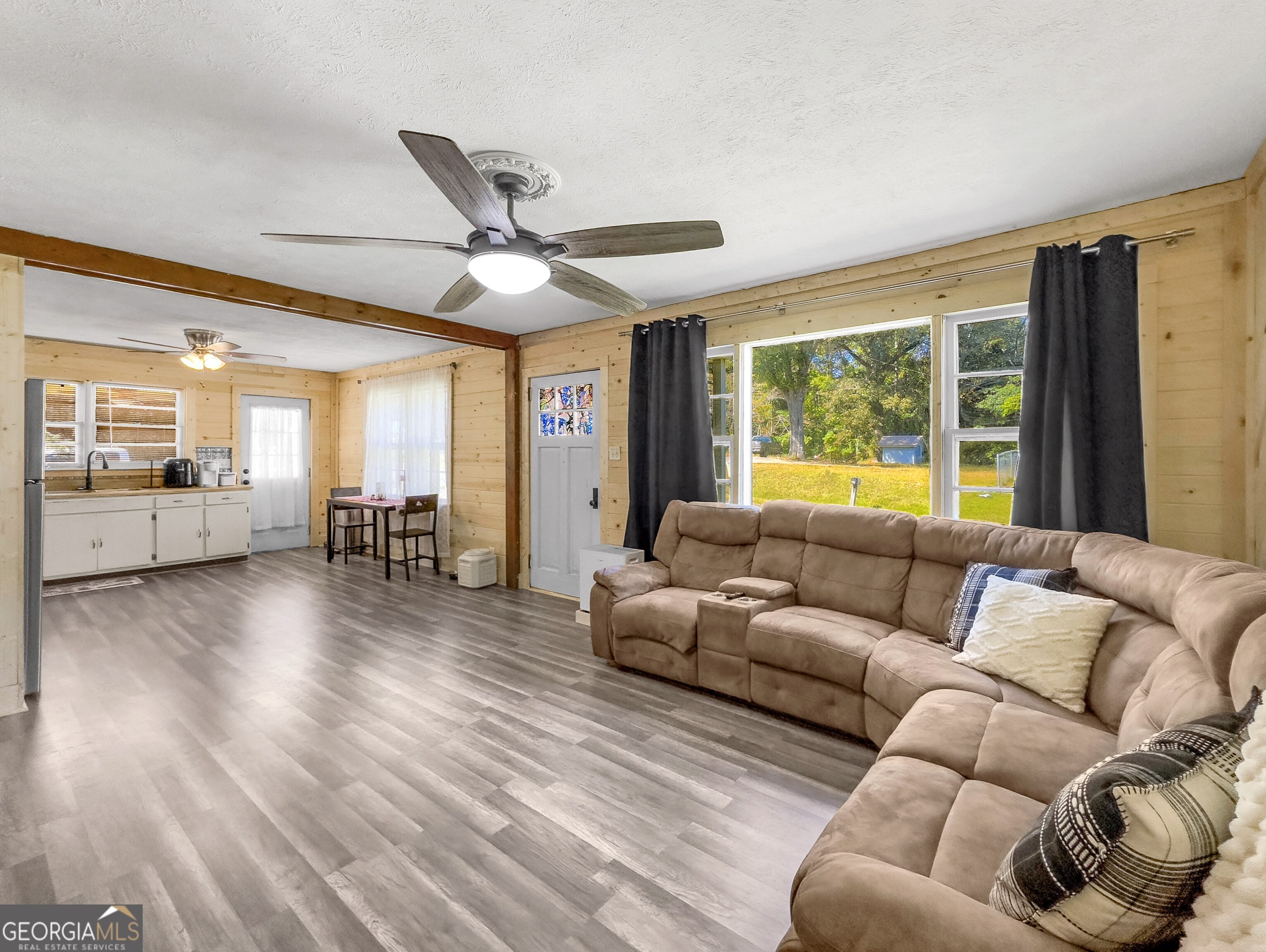 145 Apple Road Thomaston, GA 30286 - Photo 28 of 43 a living room with furniture and a large window