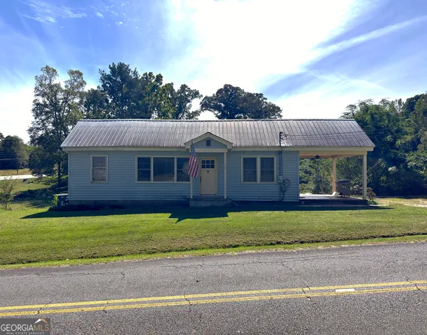 a view of a house with a swimming pool