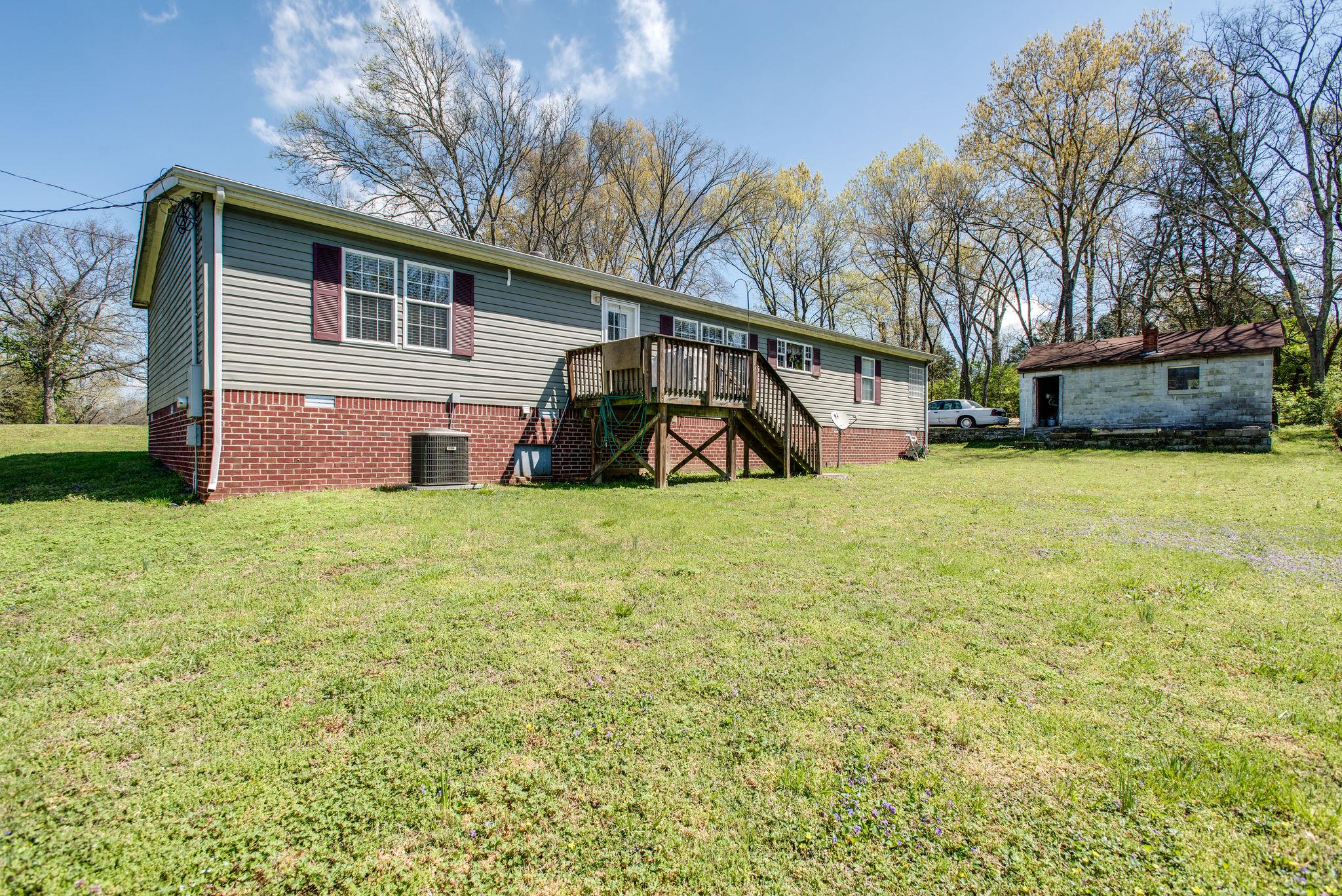 131 Rice Road Hendersonville, TN 37075 - Photo 19 of 23 Large backyard with deck to watch the sunsets