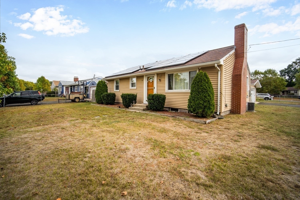 91 Arcadia Boulevard Springfield, MA 01118 - Photo 2 of 34 a view of a house with backyard and garden