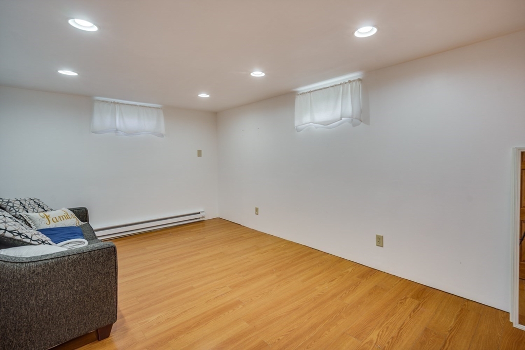 91 Arcadia Boulevard Springfield, MA 01118 - Photo 26 of 34 a view of an empty room with wooden floor