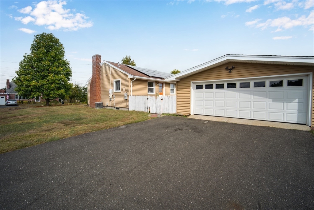 91 Arcadia Boulevard Springfield, MA 01118 - Photo 3 of 34 a view of a house with a yard