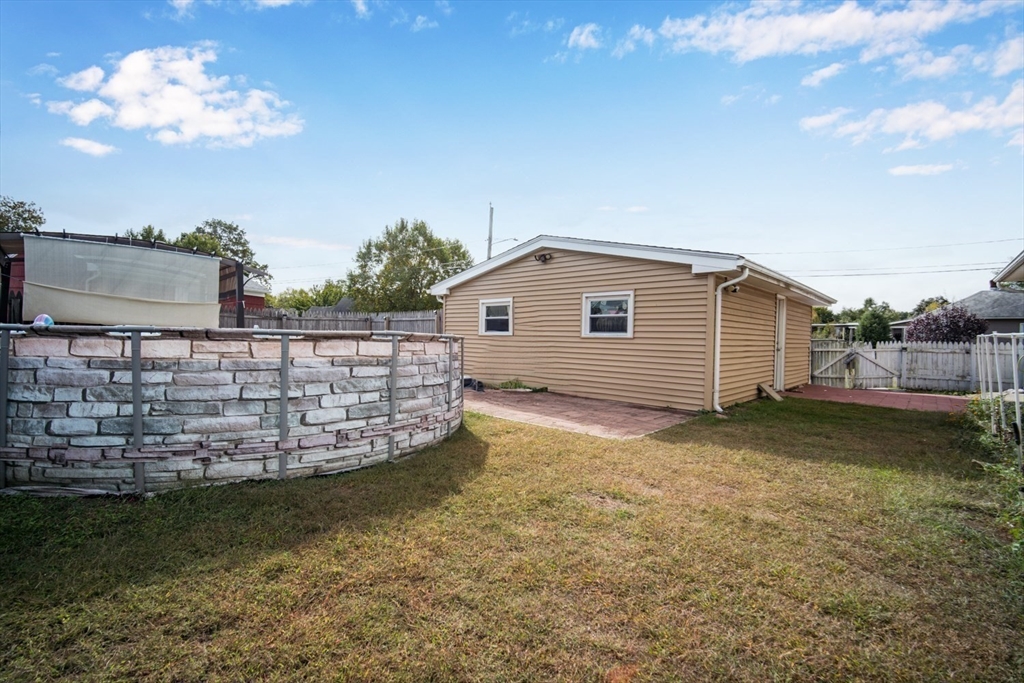 91 Arcadia Boulevard Springfield, MA 01118 - Photo 34 of 34 a view of a house with a yard