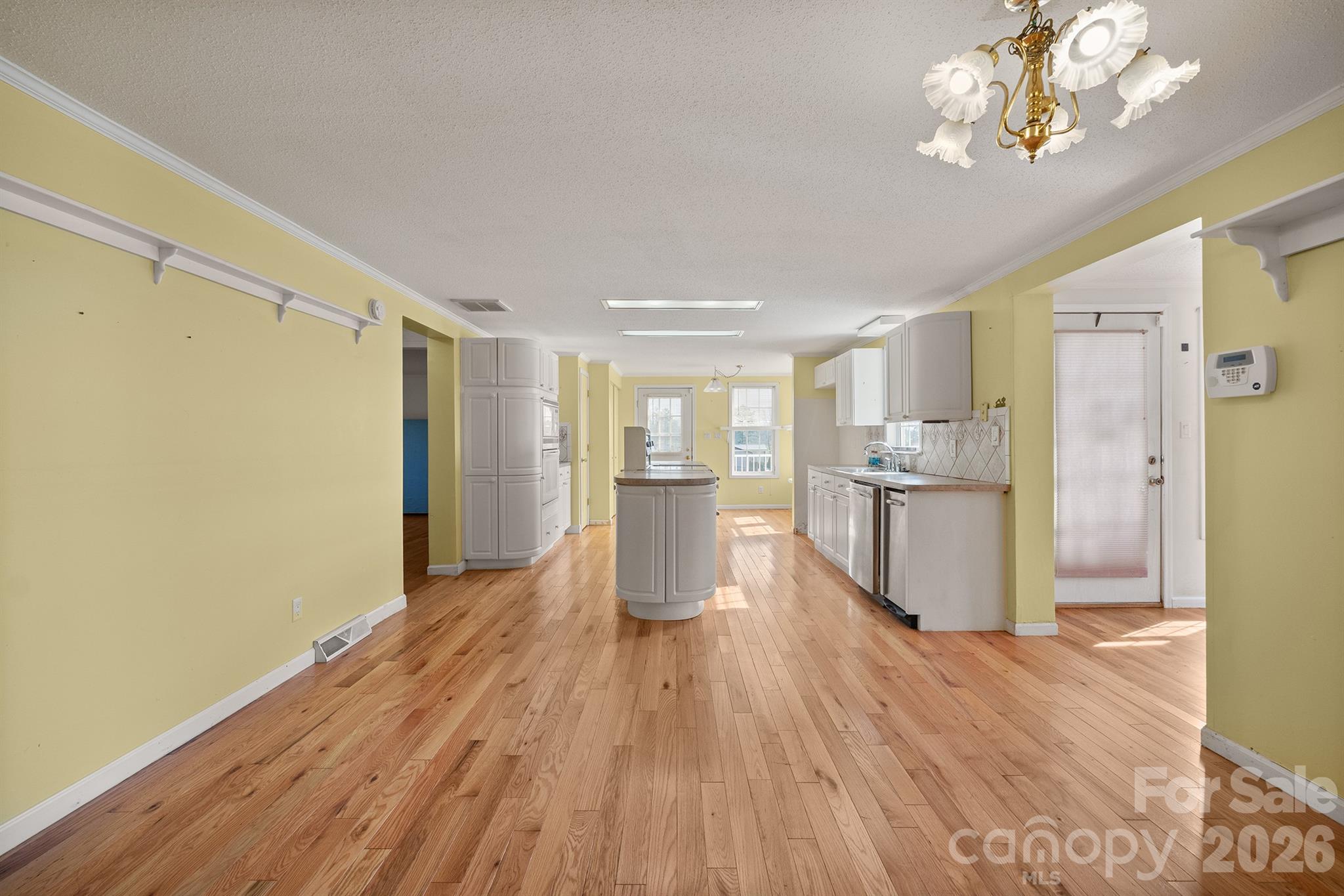2991 Sam Houser Road Vale, NC 28168 - Photo 14 of 48 a view of a kitchen with wooden floor