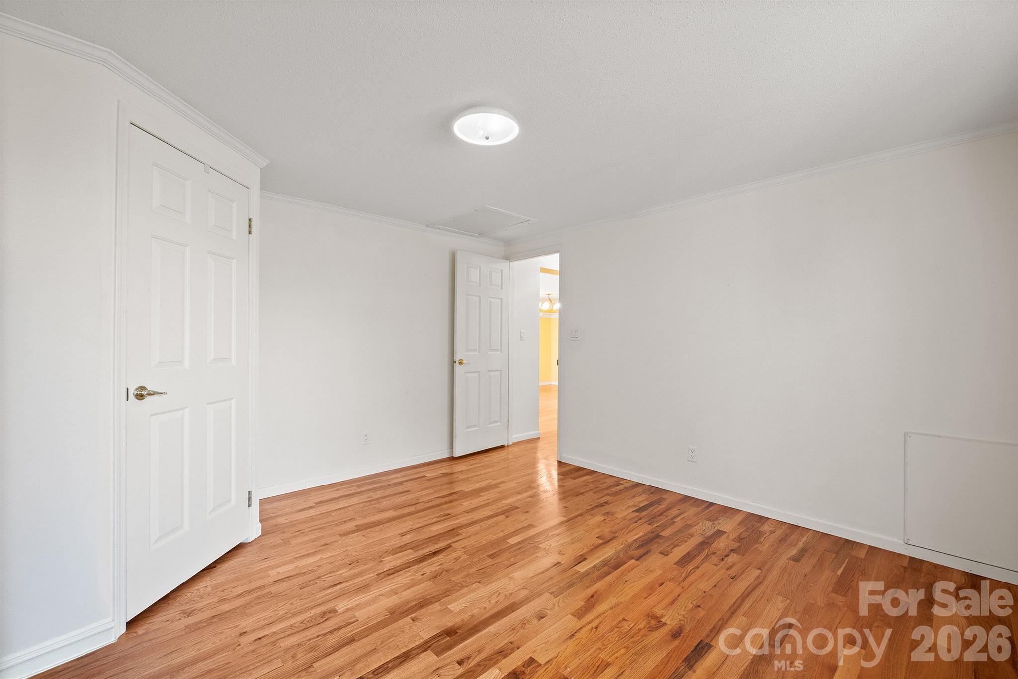 2991 Sam Houser Road Vale, NC 28168 - Photo 19 of 48 a view of an empty room with wooden floor