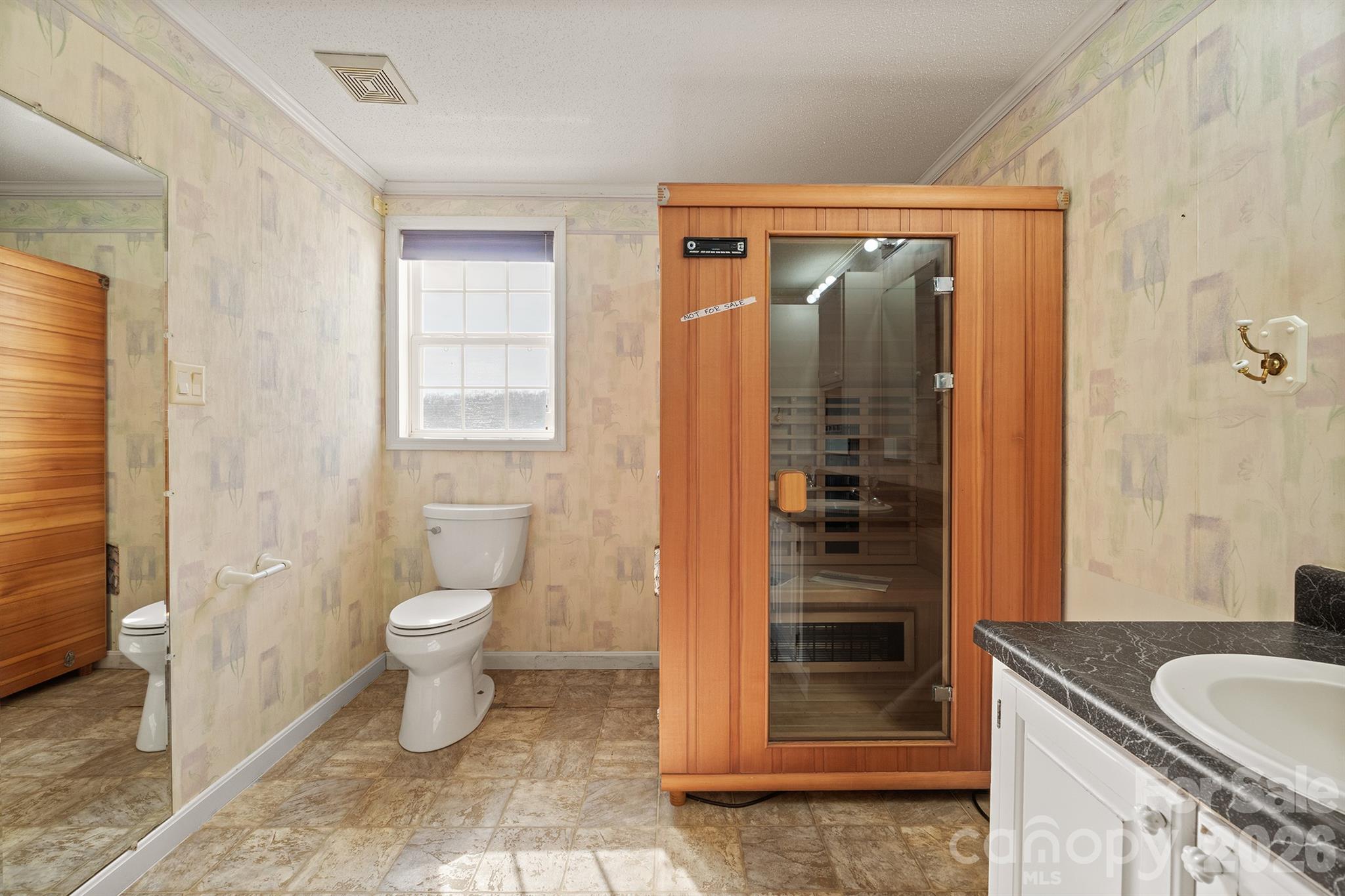 2991 Sam Houser Road Vale, NC 28168 - Photo 24 of 48 a bathroom with a granite countertop sink toilet and shower