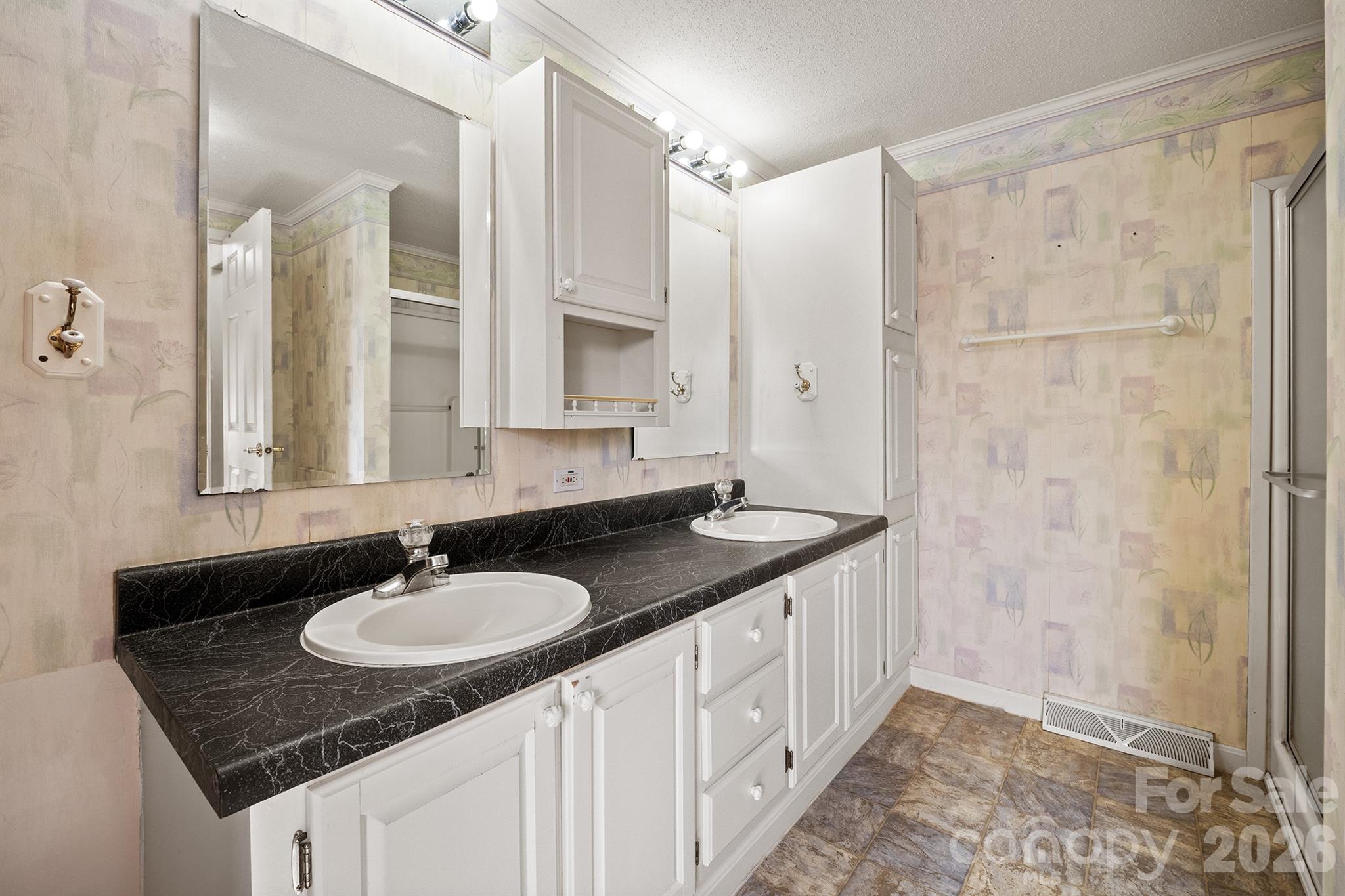 2991 Sam Houser Road Vale, NC 28168 - Photo 25 of 48 a bathroom with double sink and a mirror