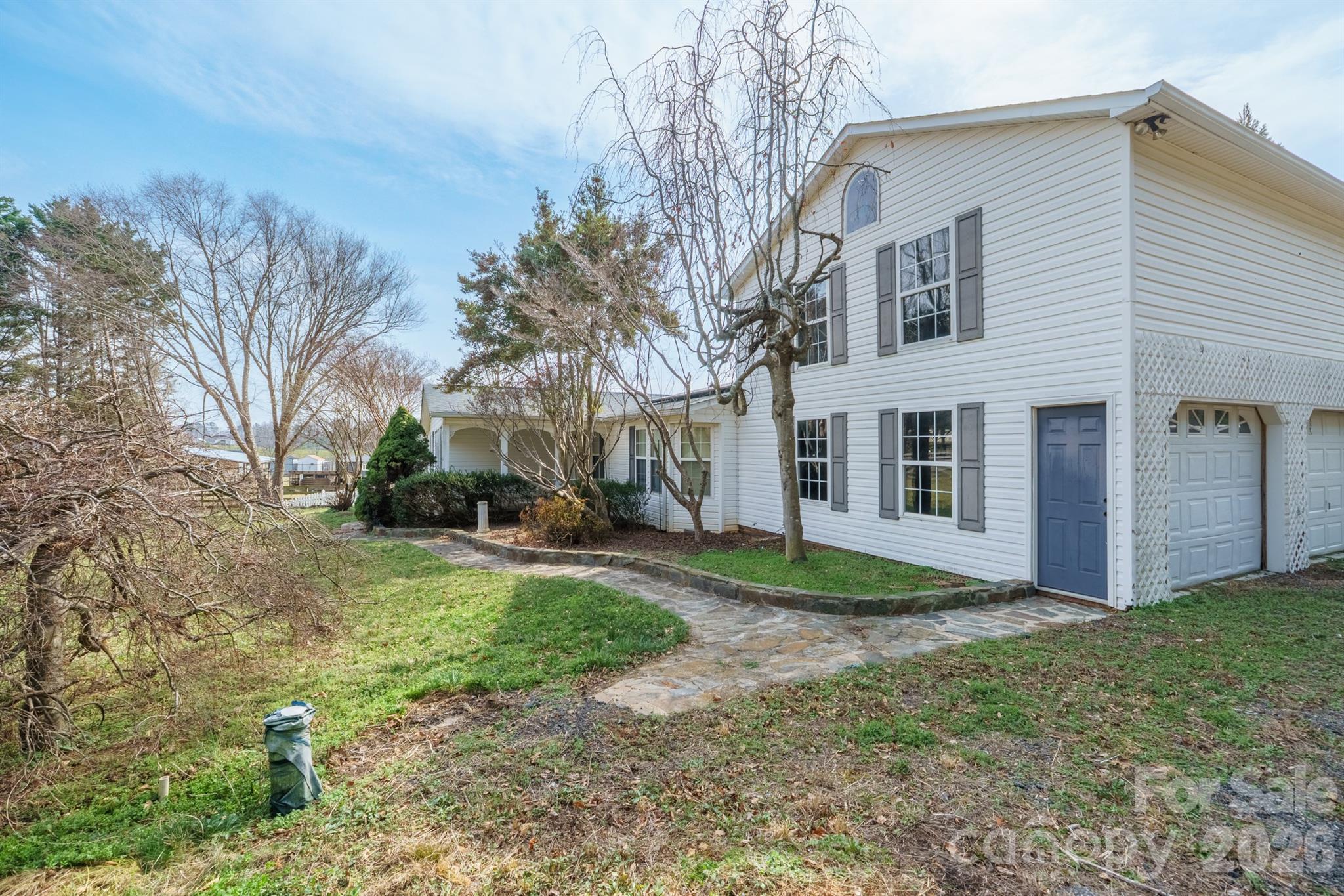 2991 Sam Houser Road Vale, NC 28168 - Photo 3 of 48 a view of a yard with a house
