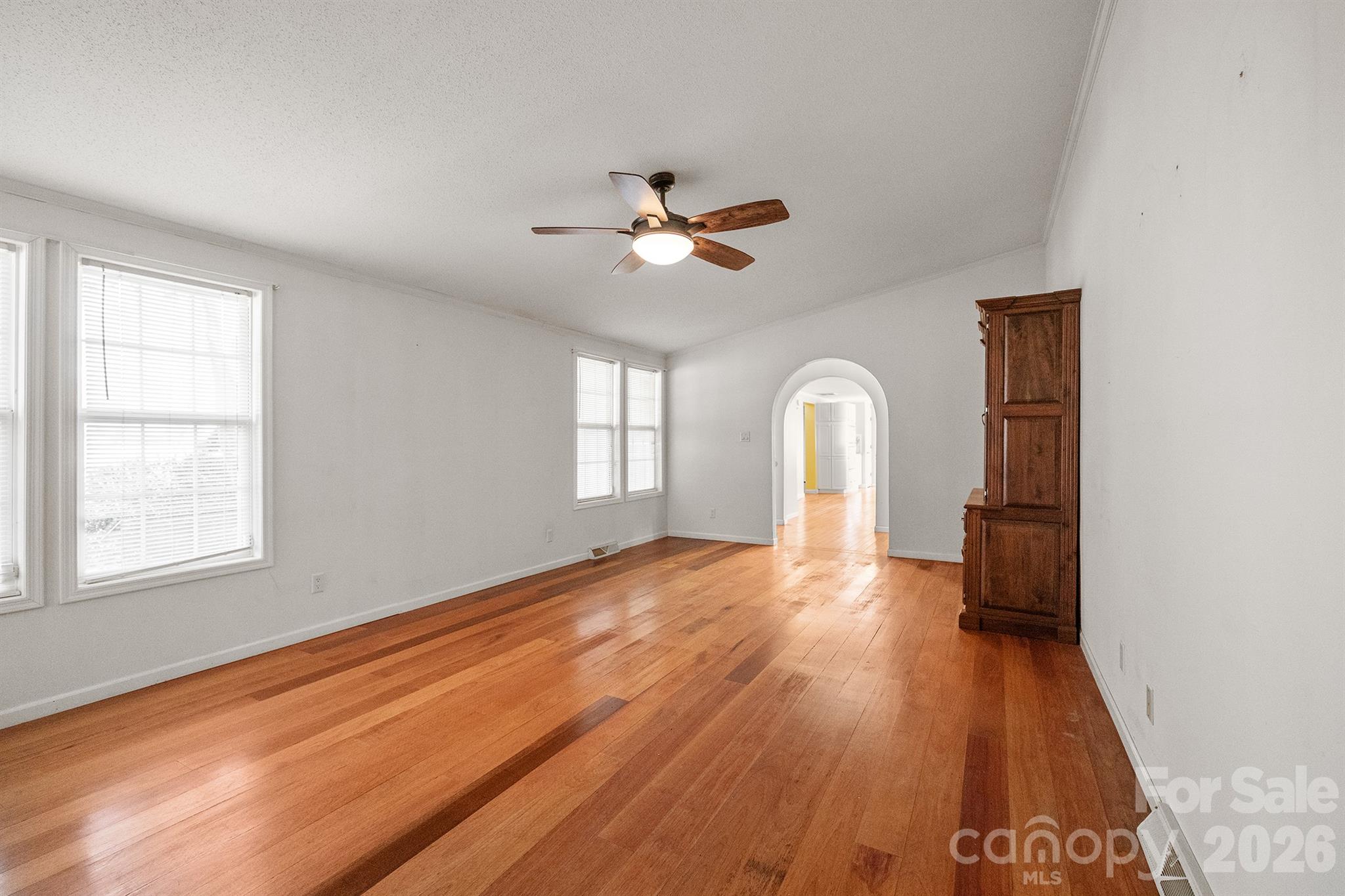 2991 Sam Houser Road Vale, NC 28168 - Photo 31 of 48 a view of empty room with wooden floor and fan