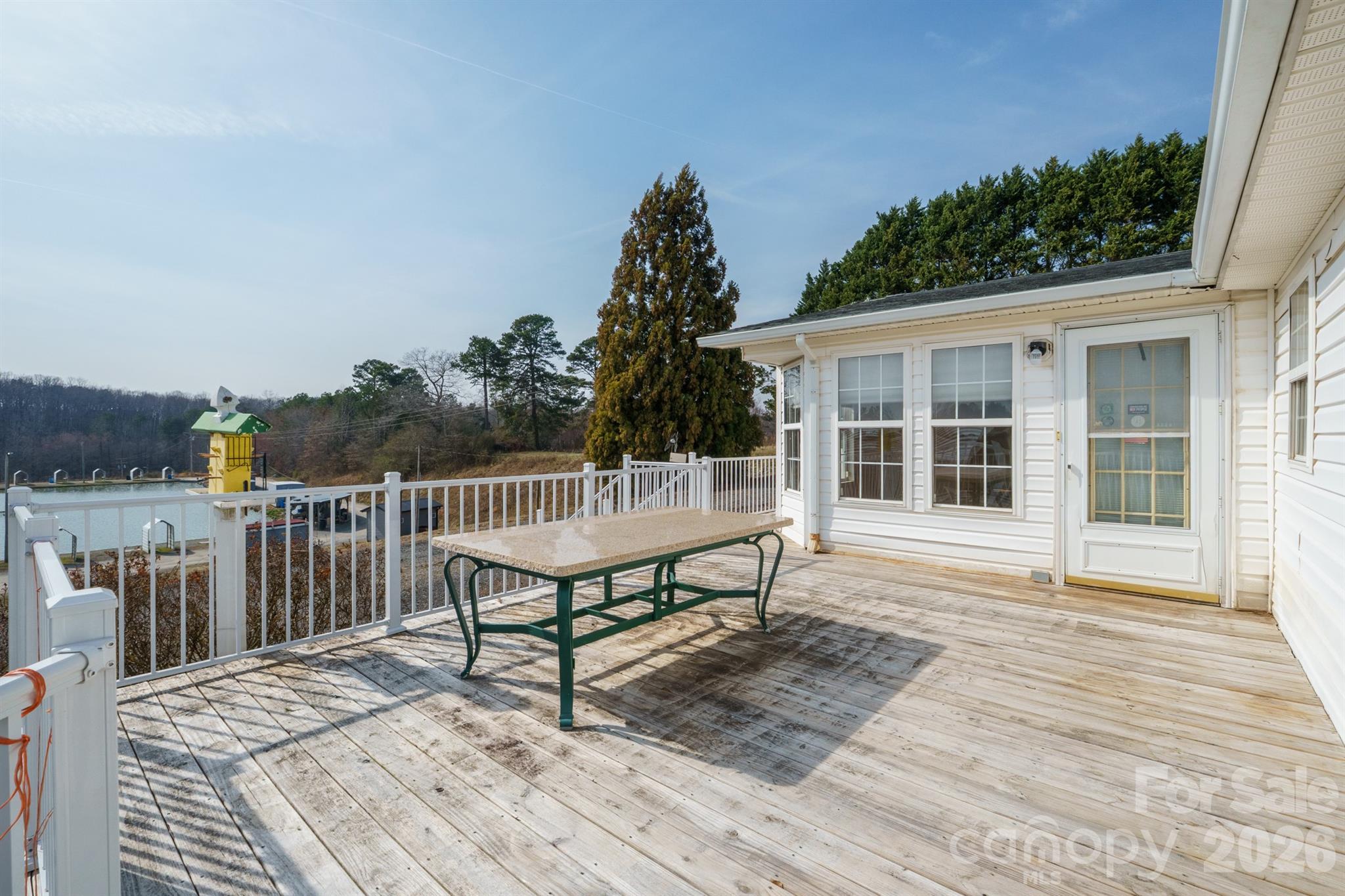 2991 Sam Houser Road Vale, NC 28168 - Photo 39 of 48 a view of a house with a deck