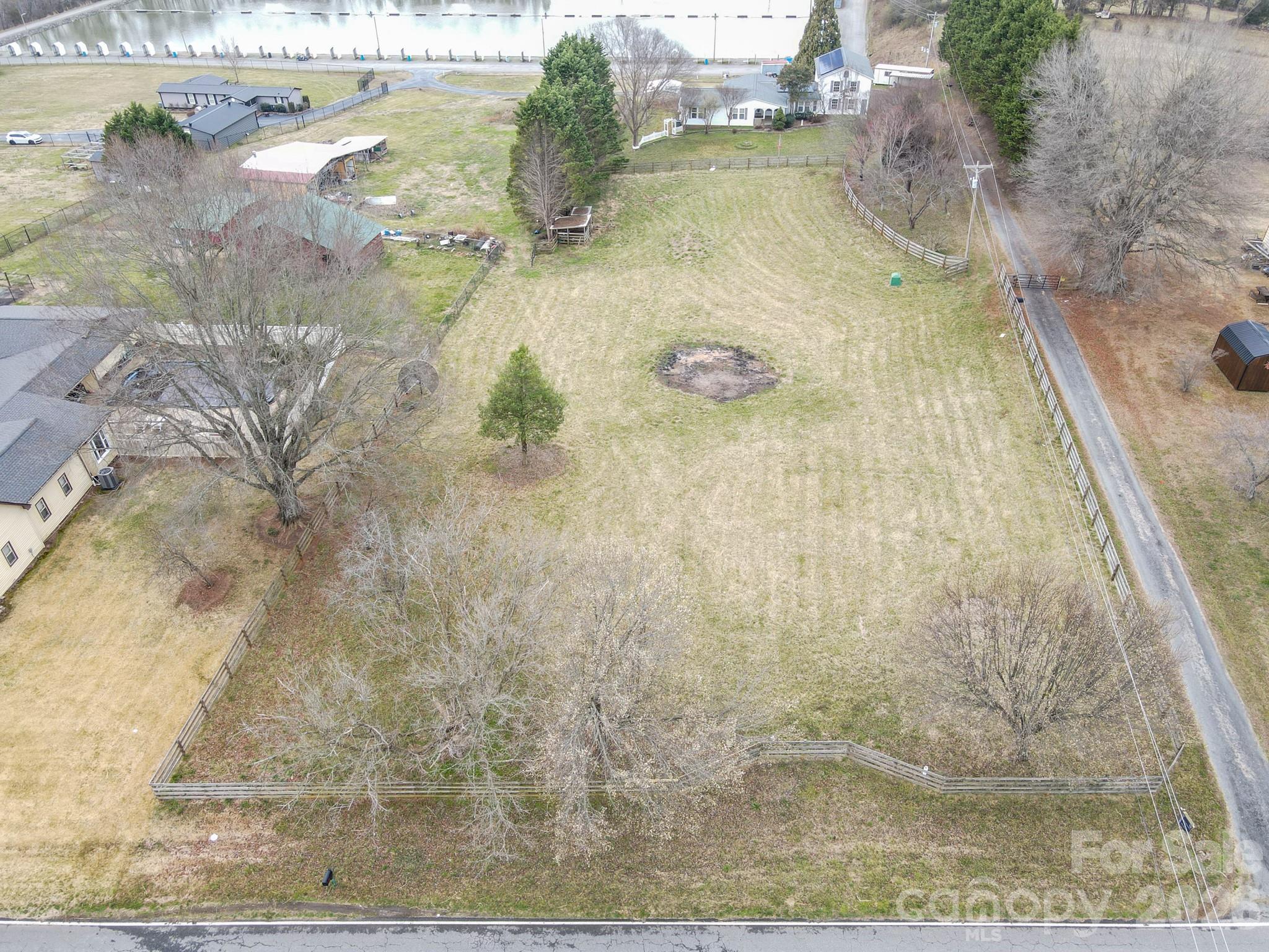 2991 Sam Houser Road Vale, NC 28168 - Photo 46 of 48 a view of swimming pool with a yard