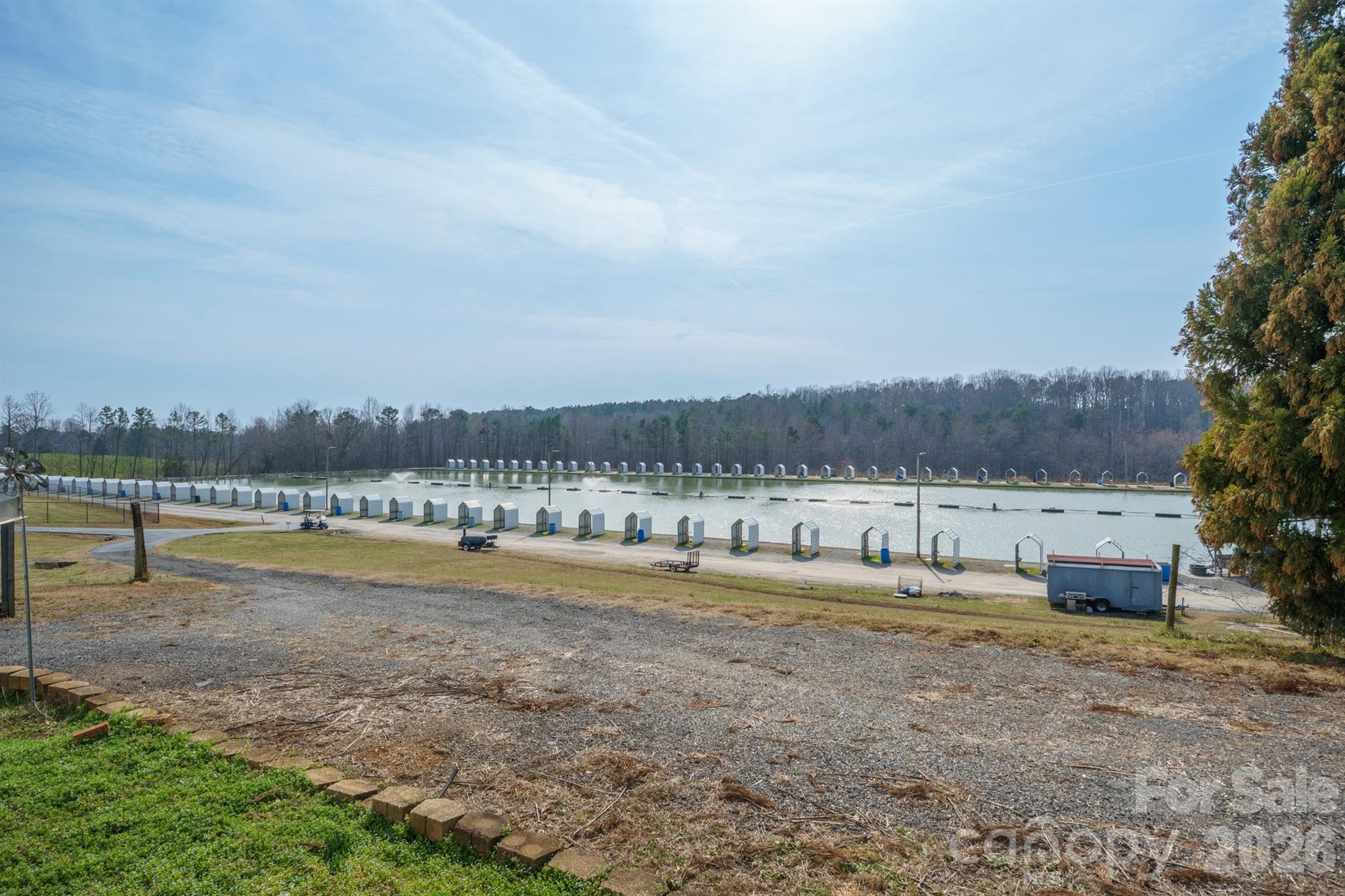 2991 Sam Houser Road Vale, NC 28168 - Photo 6 of 48 a view of swimming pool and mountain in the back