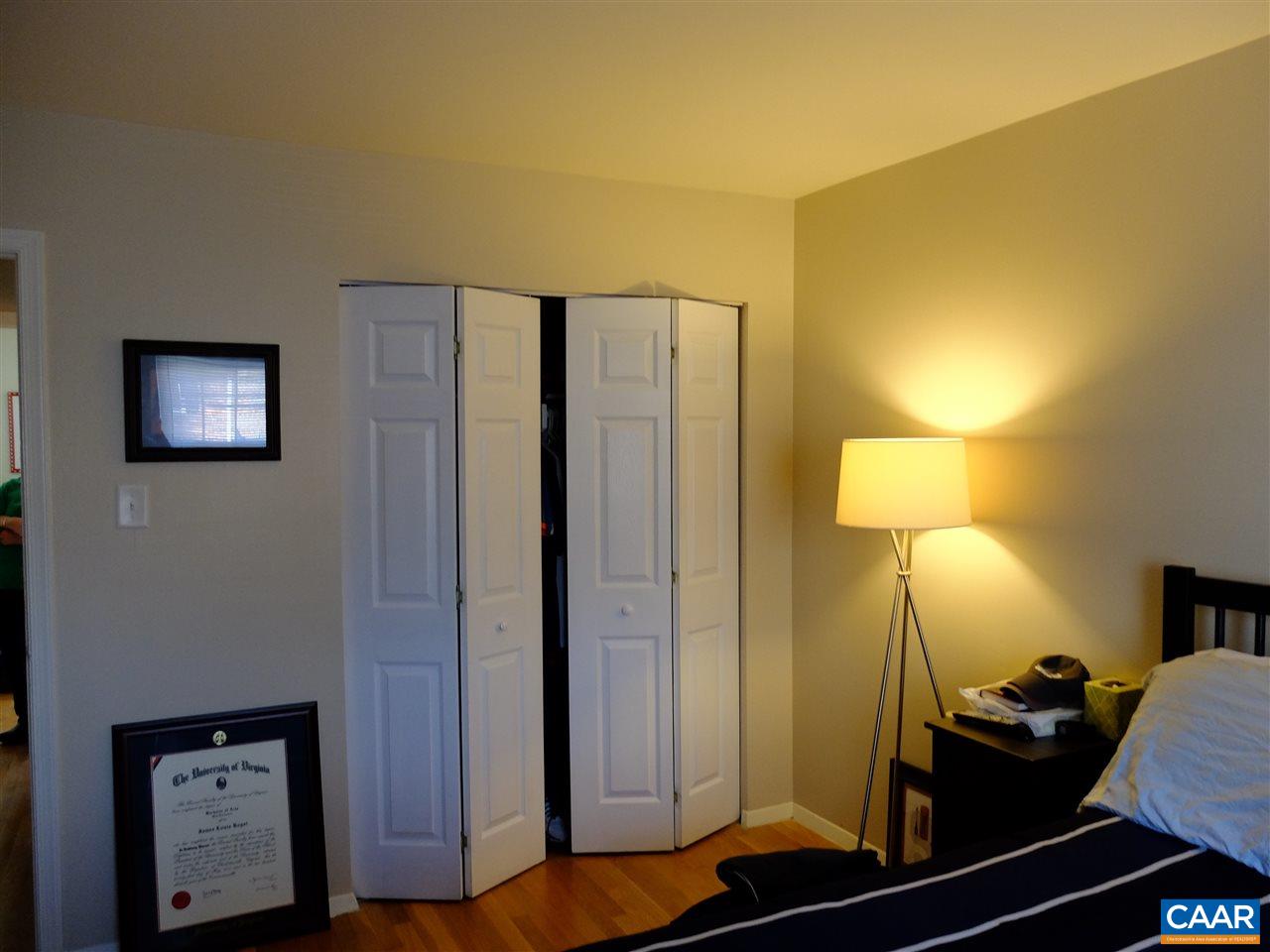 115 Hessian Hills Ridge, Unit 3 Charlottesville, VA 22901 - Photo 11 of 22 a bathroom with a mirror and a shower