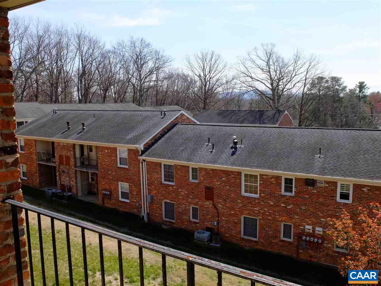115 Hessian Hills Ridge, Unit 3 Charlottesville, VA 22901 - Photo 14 of 22 a front view of a house with a yard