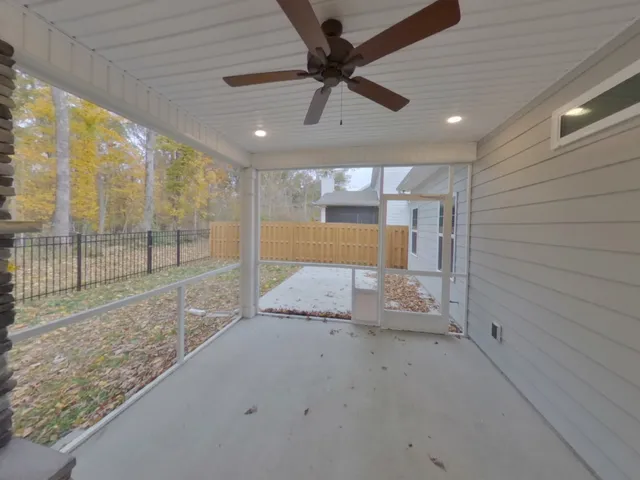 a view of a livingroom with a ceiling fan