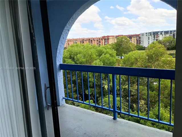 a view of a large window with an outdoor space