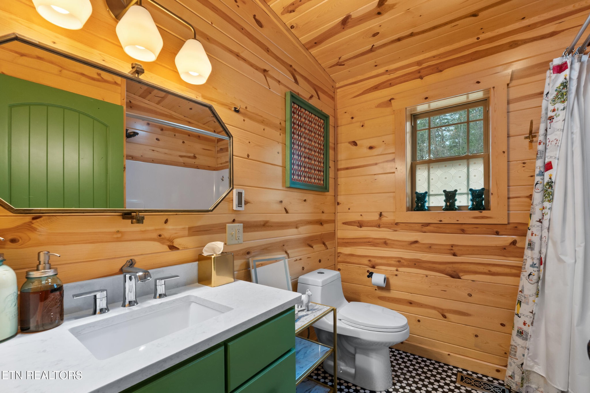 1132 Pinyon Circle Sevierville, TN 37863 - Photo 15 of 25 a bathroom with a sink a toilet and mirror