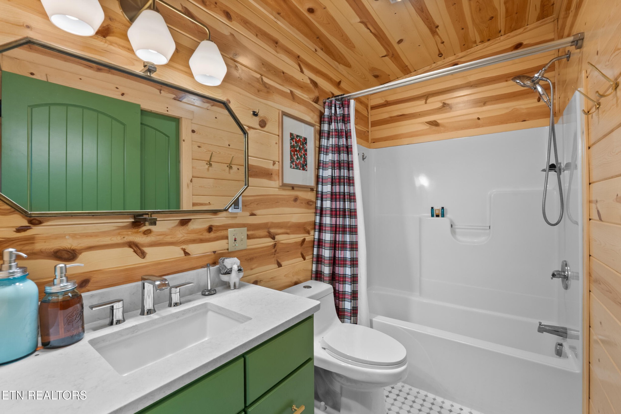 1132 Pinyon Circle Sevierville, TN 37863 - Photo 18 of 25 a bathroom with a sink mirror toilet and shower