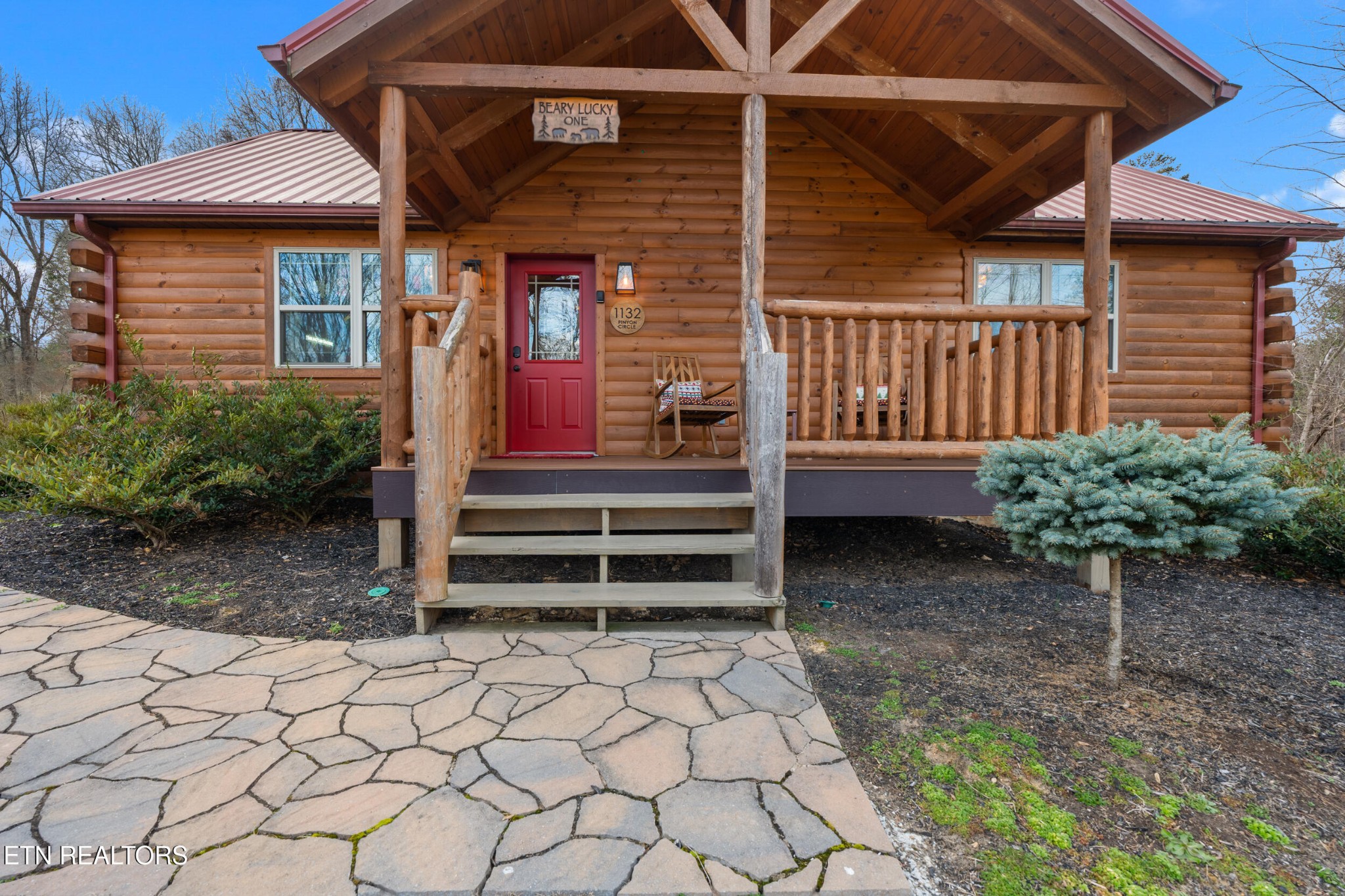 1132 Pinyon Circle Sevierville, TN 37863 - Photo 2 of 25 a front view of a house with a yard