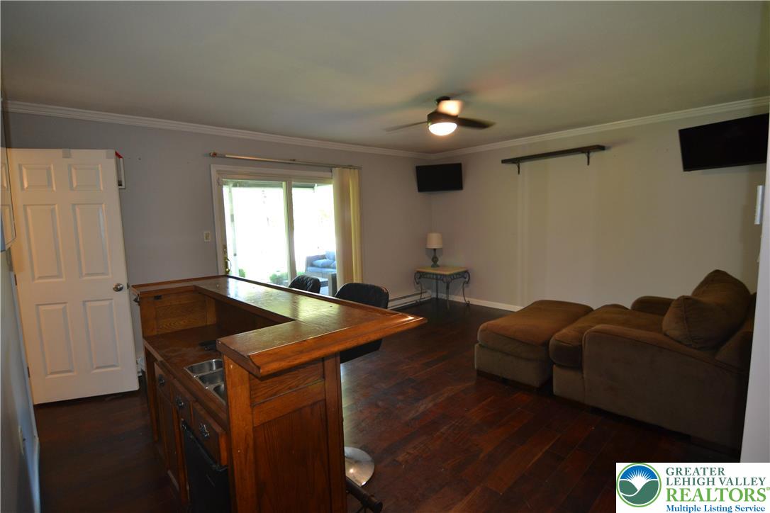 3071 Athena Drive Bethlehem, PA 18017 - Photo 25 of 27 a room with furniture and a flat screen tv