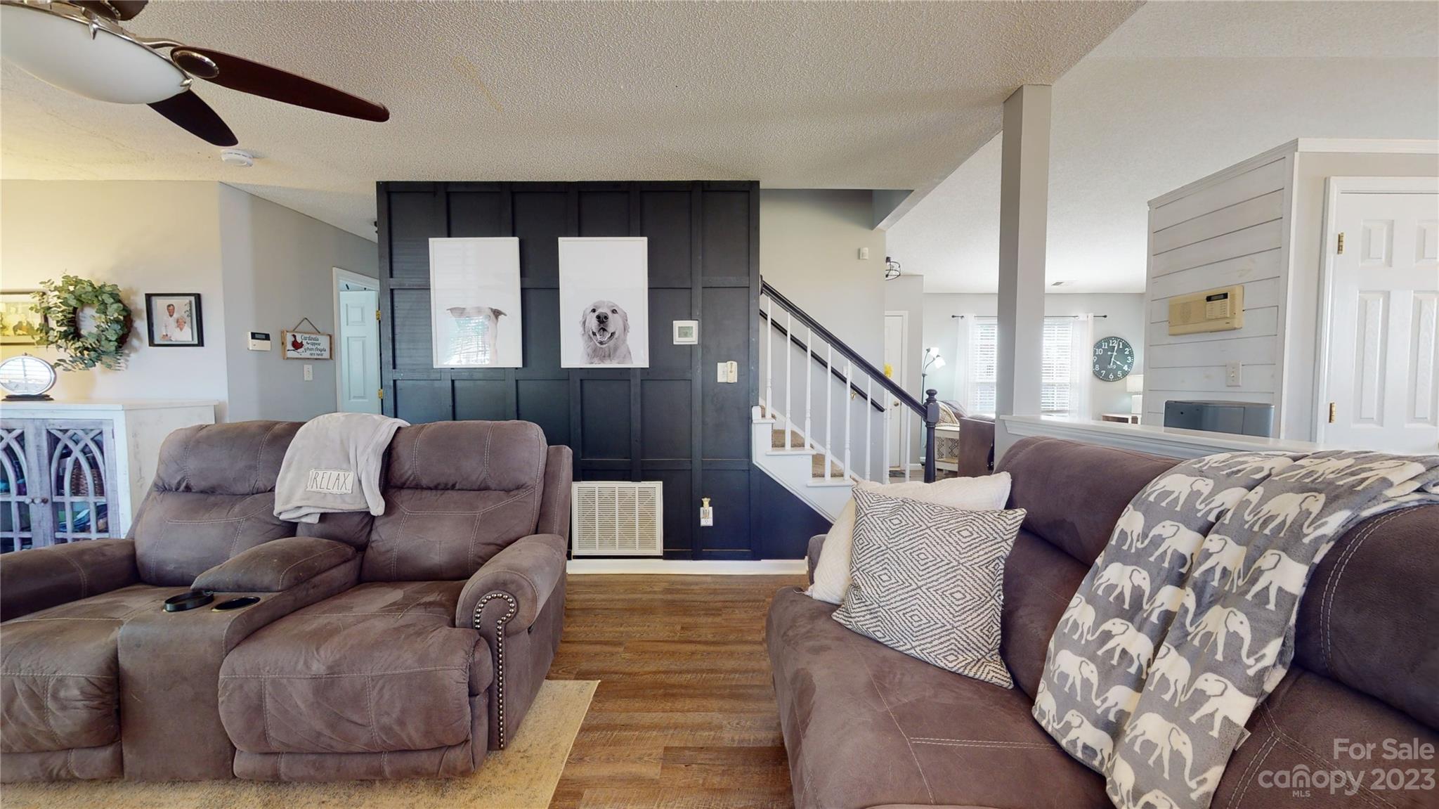 1007 Great Falls Drive Monroe, NC 28110 - Photo 12 of 45 a living room with furniture and stairs