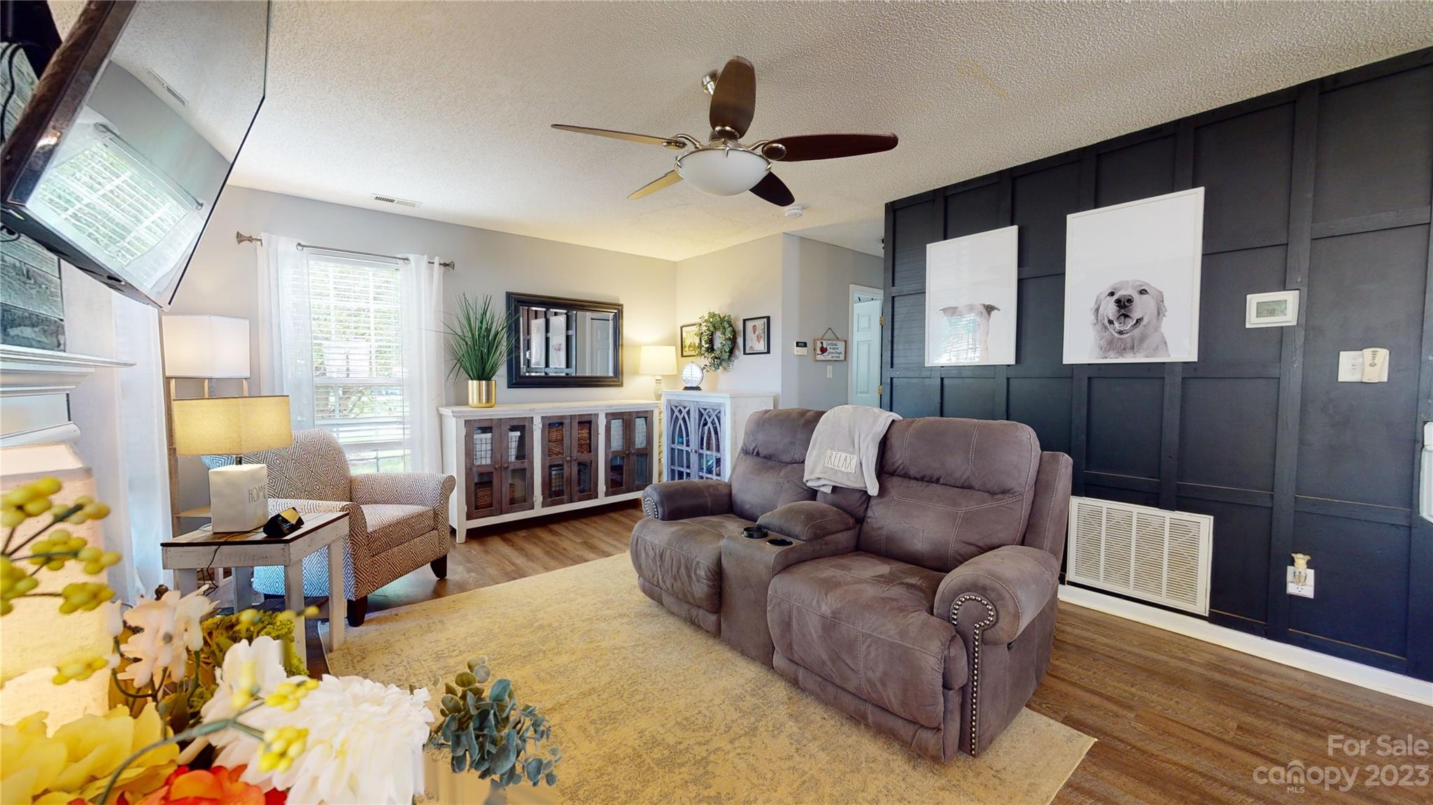1007 Great Falls Drive Monroe, NC 28110 - Photo 13 of 45 a living room with furniture and a flat screen tv