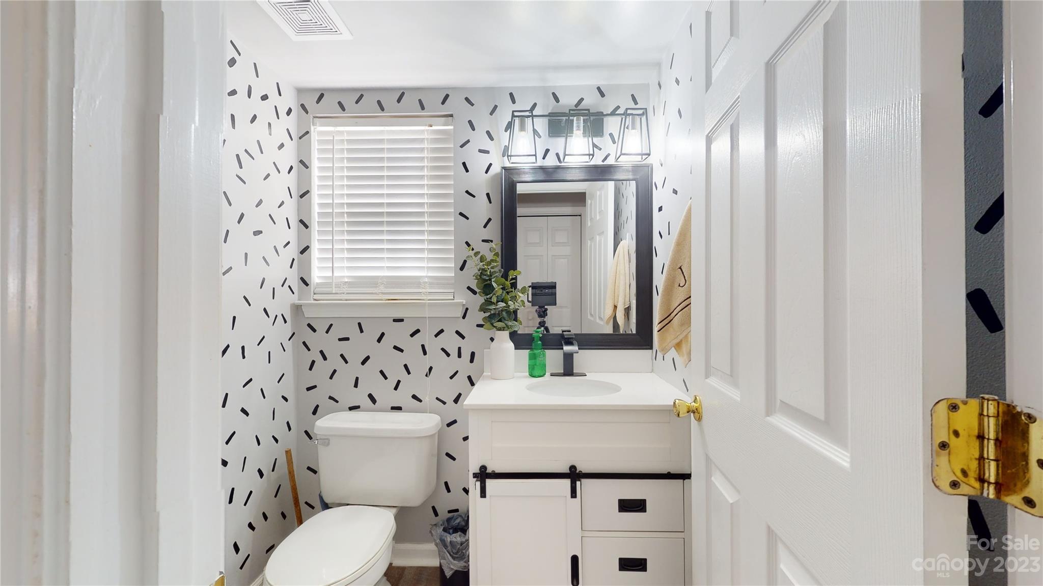 1007 Great Falls Drive Monroe, NC 28110 - Photo 17 of 45 a bathroom with a sink toilet and shower
