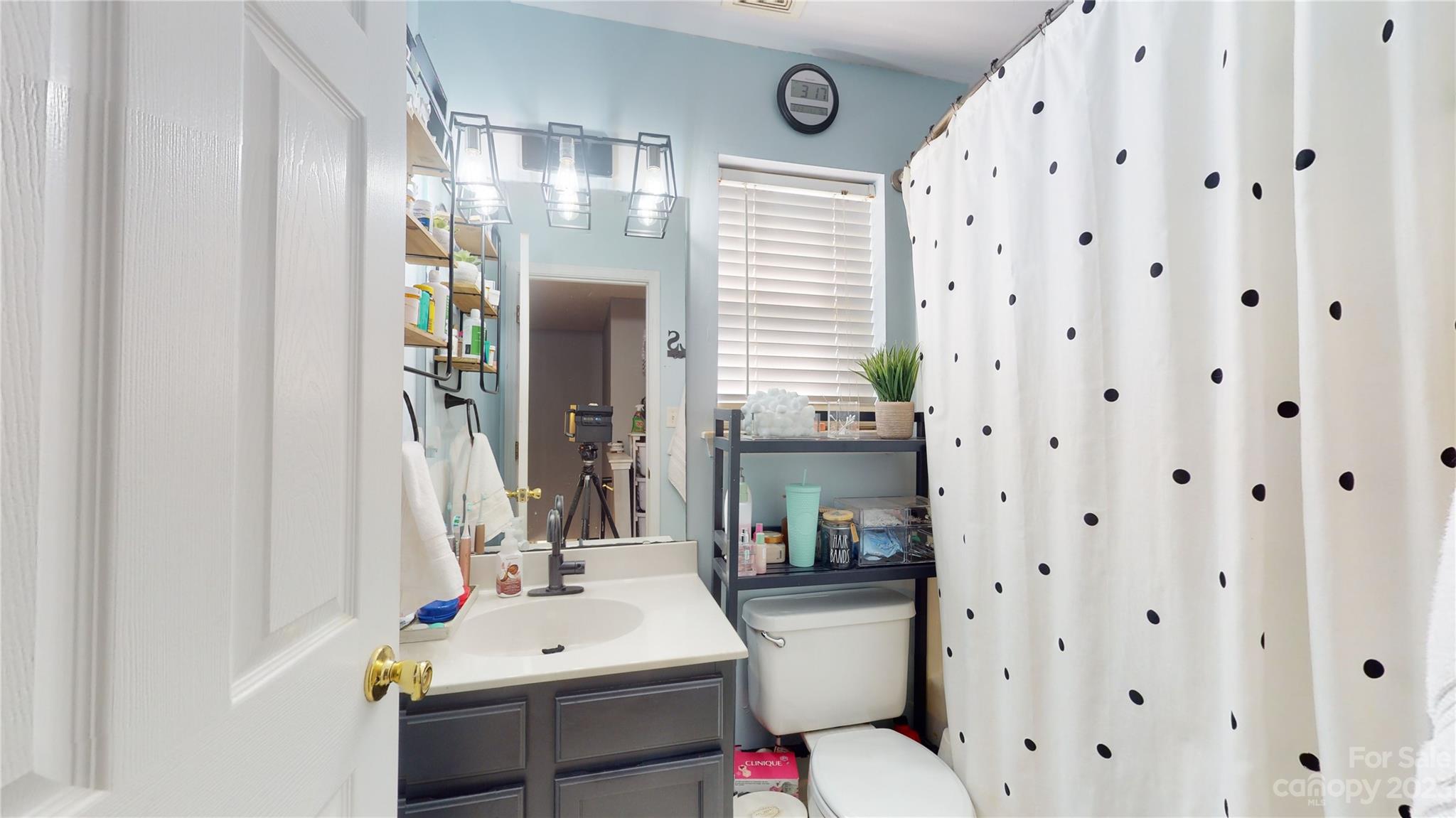 1007 Great Falls Drive Monroe, NC 28110 - Photo 20 of 45 a bathroom with a sink toilet and shower