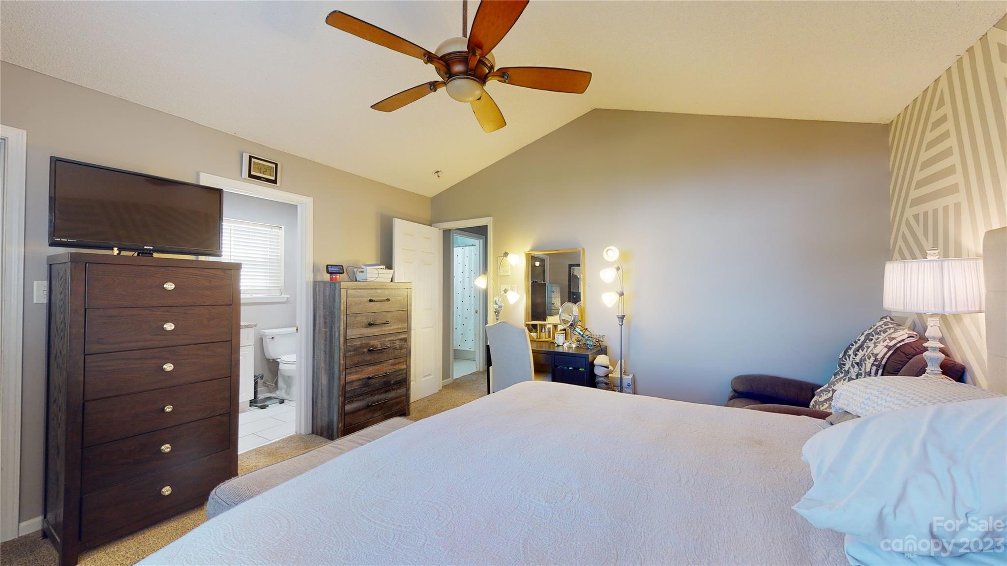 1007 Great Falls Drive Monroe, NC 28110 - Photo 24 of 45 a bedroom with a bed and a dresser